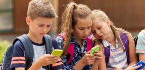 Children using smartphones
