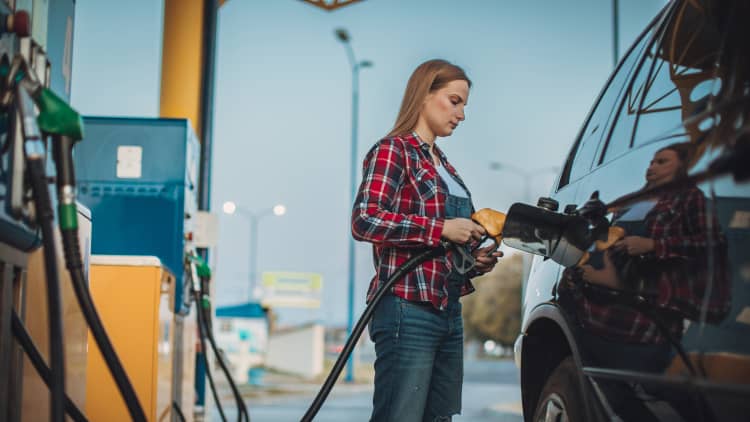 Americans buying fuel