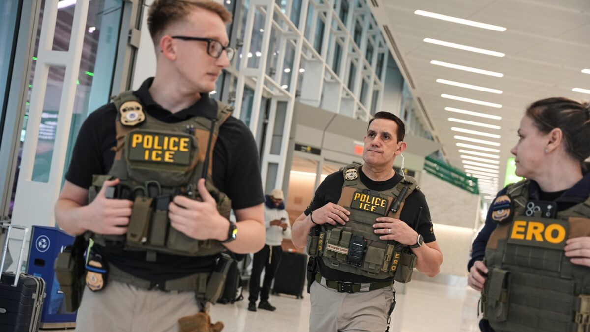 ICE officers at an airport
