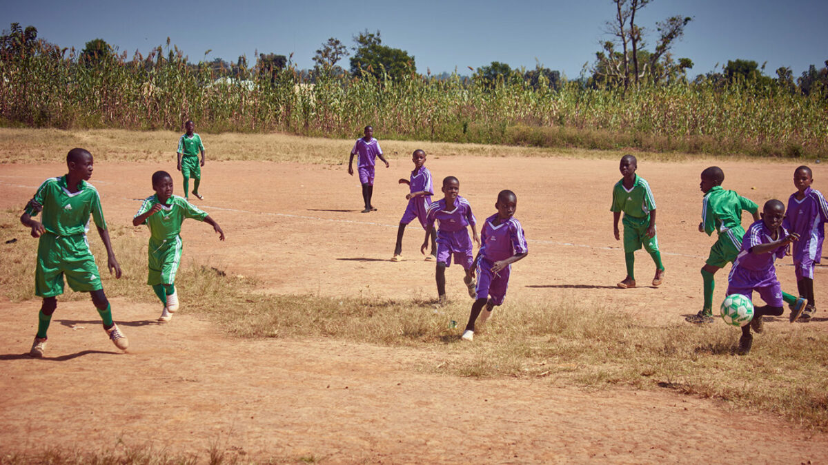Kids playing football