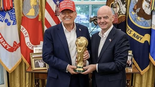Trump holding World Cup trophy with Infantino