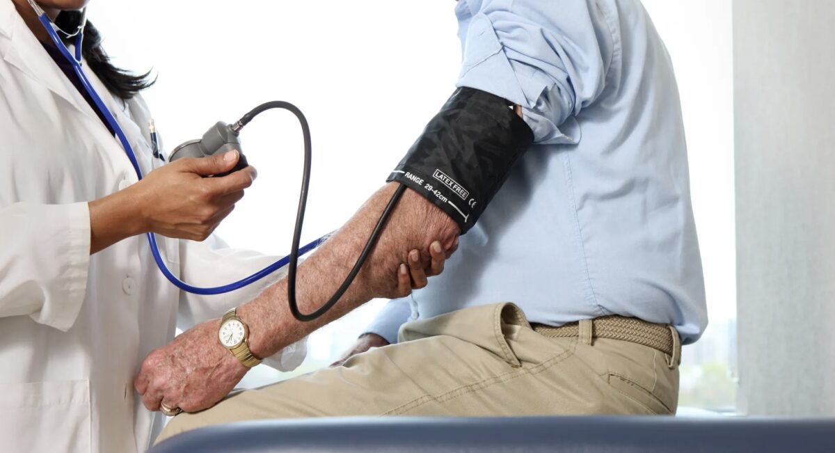 Someone having his BP checked