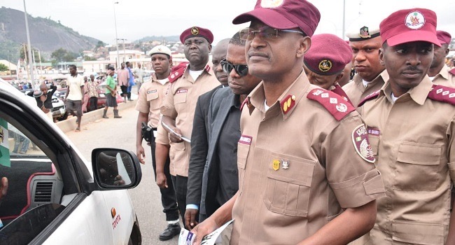 FRSC Corps Marshal Shehu Mohammed with personnel)