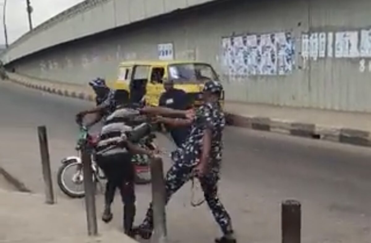 police brutalising the motorcyclist