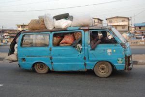 An overloaded bus used to illustrate the story