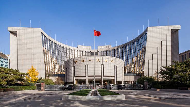 China reduces interest rates as economy struggles