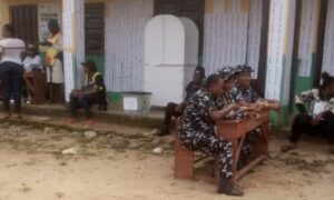 Security operatives enjoying groundnuts at polling unit