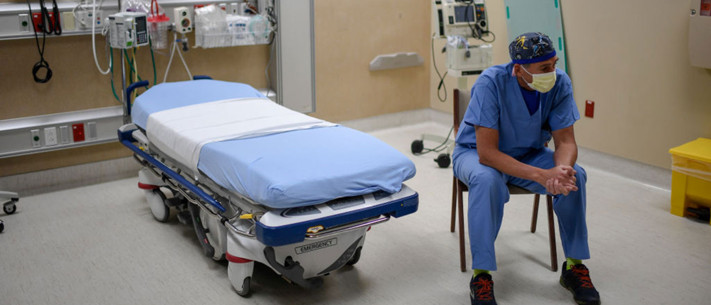 A healthworker in a hospital ward