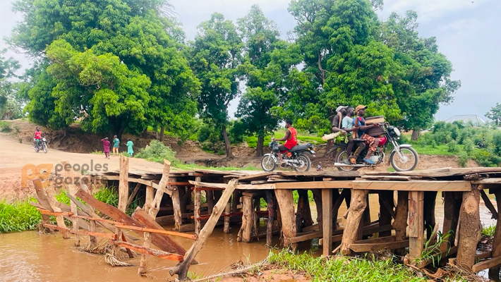 A makeshift bridge made by the community.