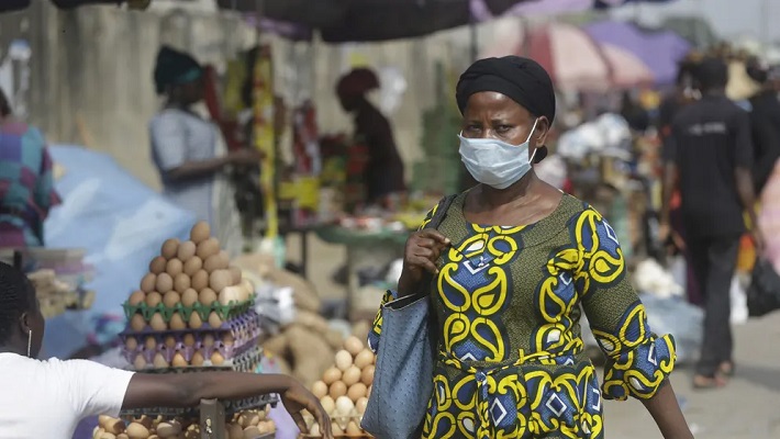 A woman wearing facemask used to tell the story