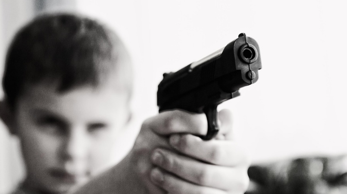 American child with gun (Credit: madison365)