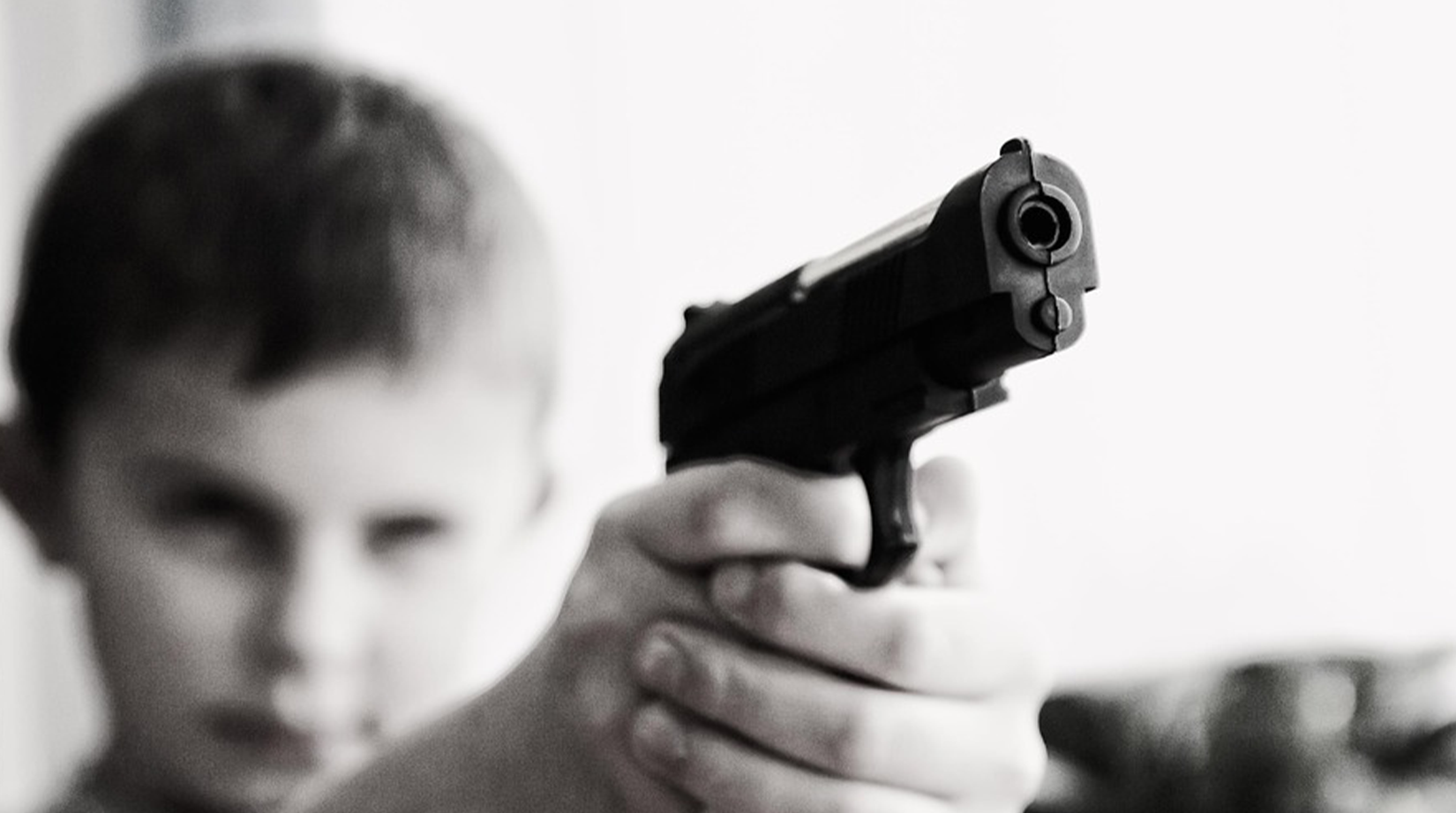 American child with gun (Credit: madison365)