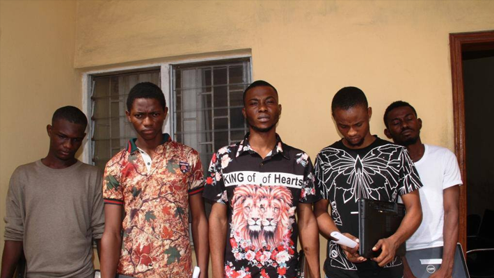 Paraded internet fraudsters