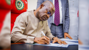 Otti signing document