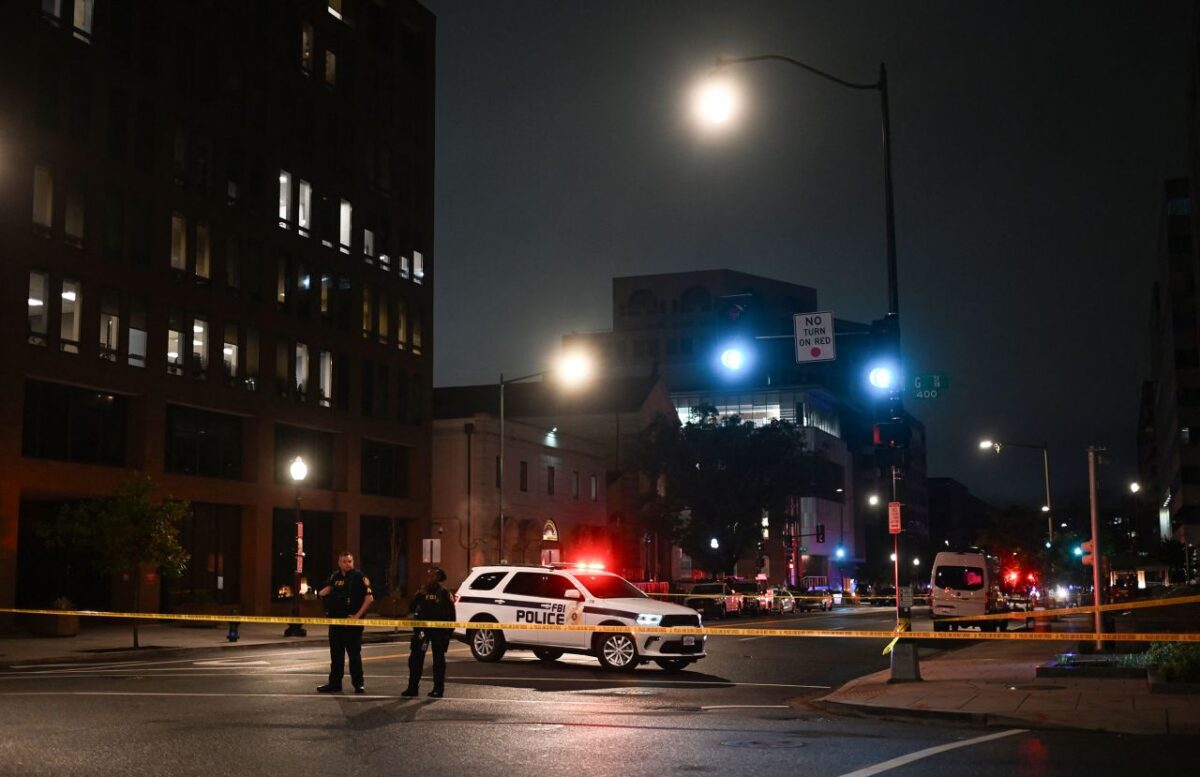FBI agents cordon off the scene of the shooting outside the Capital Jewish Museum.