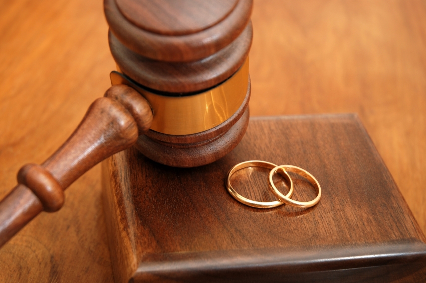 Gavel and wedding rings used to illustrate the story