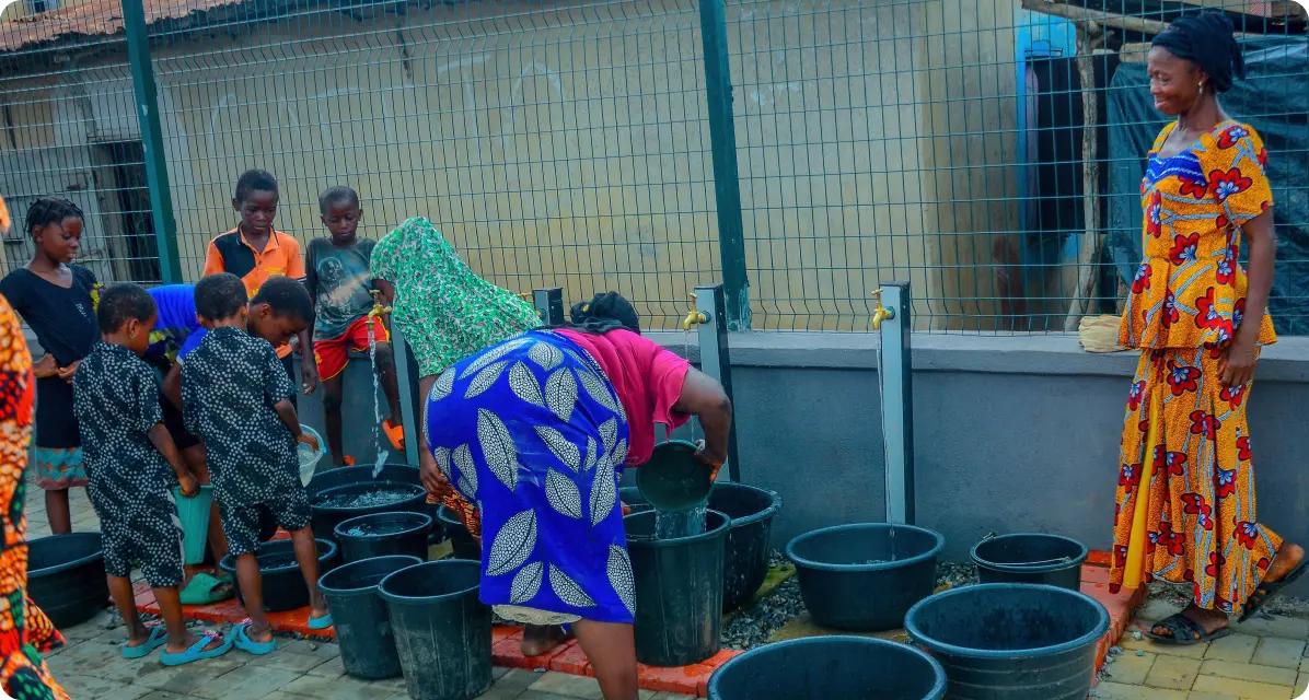Residents fetching water from taps