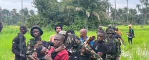 Troops with rescued victims