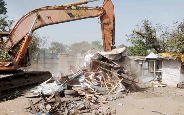 Demolition of shanties behind National Park and National Military Cemetery