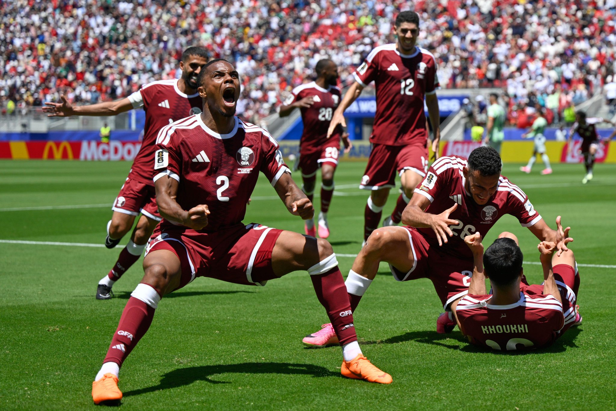 Qatar’s Maroon One team celebrating late goal against Switzerland