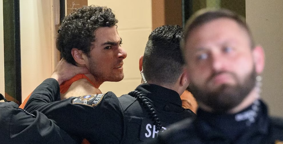 Murder suspect held by police