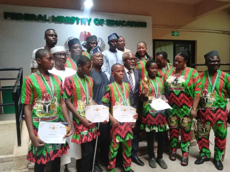 Nigerian students with trophies