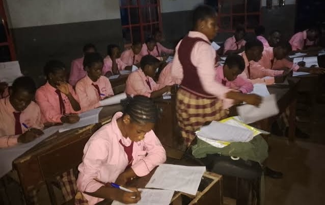 Students paper at night