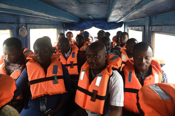 Boat passengers wearing life jackets
