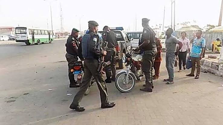 Police accosting Okada riders
