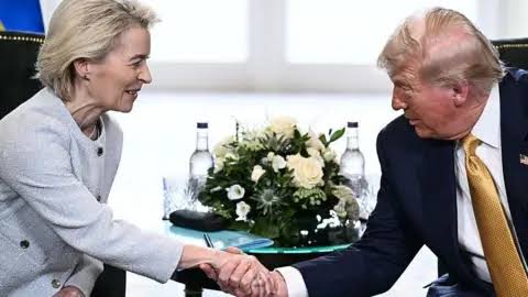 Donald Trump speaking with EU president Credit:BBC