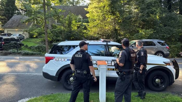 FBI agents at the home of John Bolton