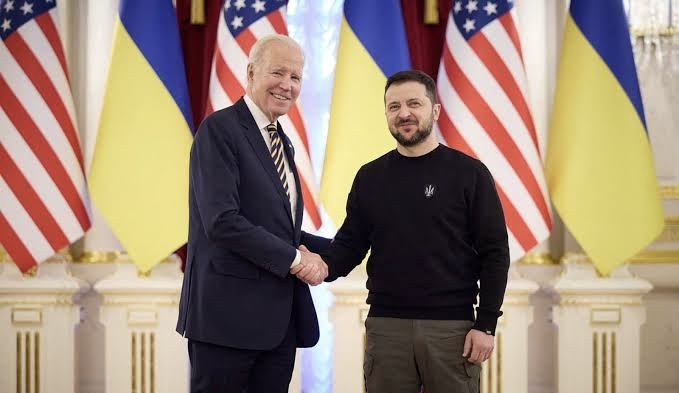 Zelensky shaking hands with Biden