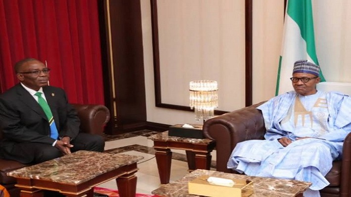 Muhidin Moweto and Muhammadu Buhari