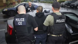 ICE officers making arrest