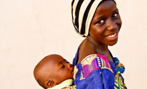 A young mother with a baby