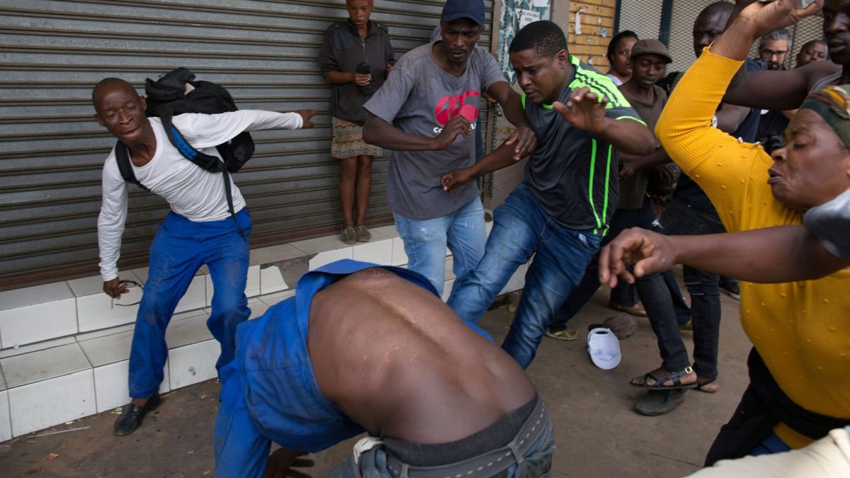 A vigilante mob attacks