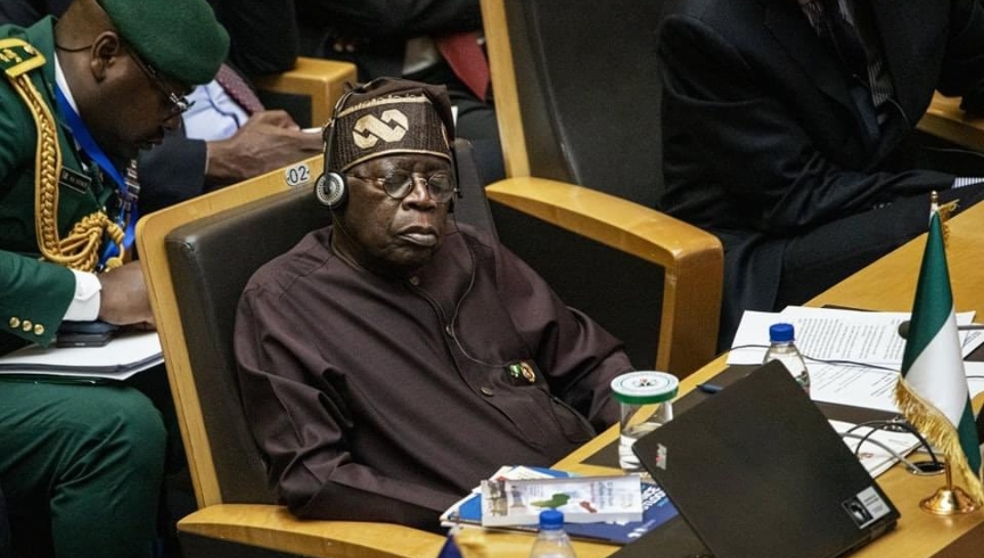 President Bola Tinubu sleeping at AU session (Credit: Michele Spatari/AFP)