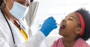 A black child suffering from adenoiditis