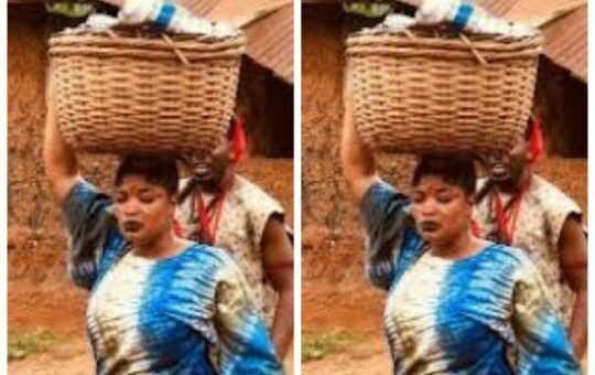Temitope Hamzat carrying a basket on her head