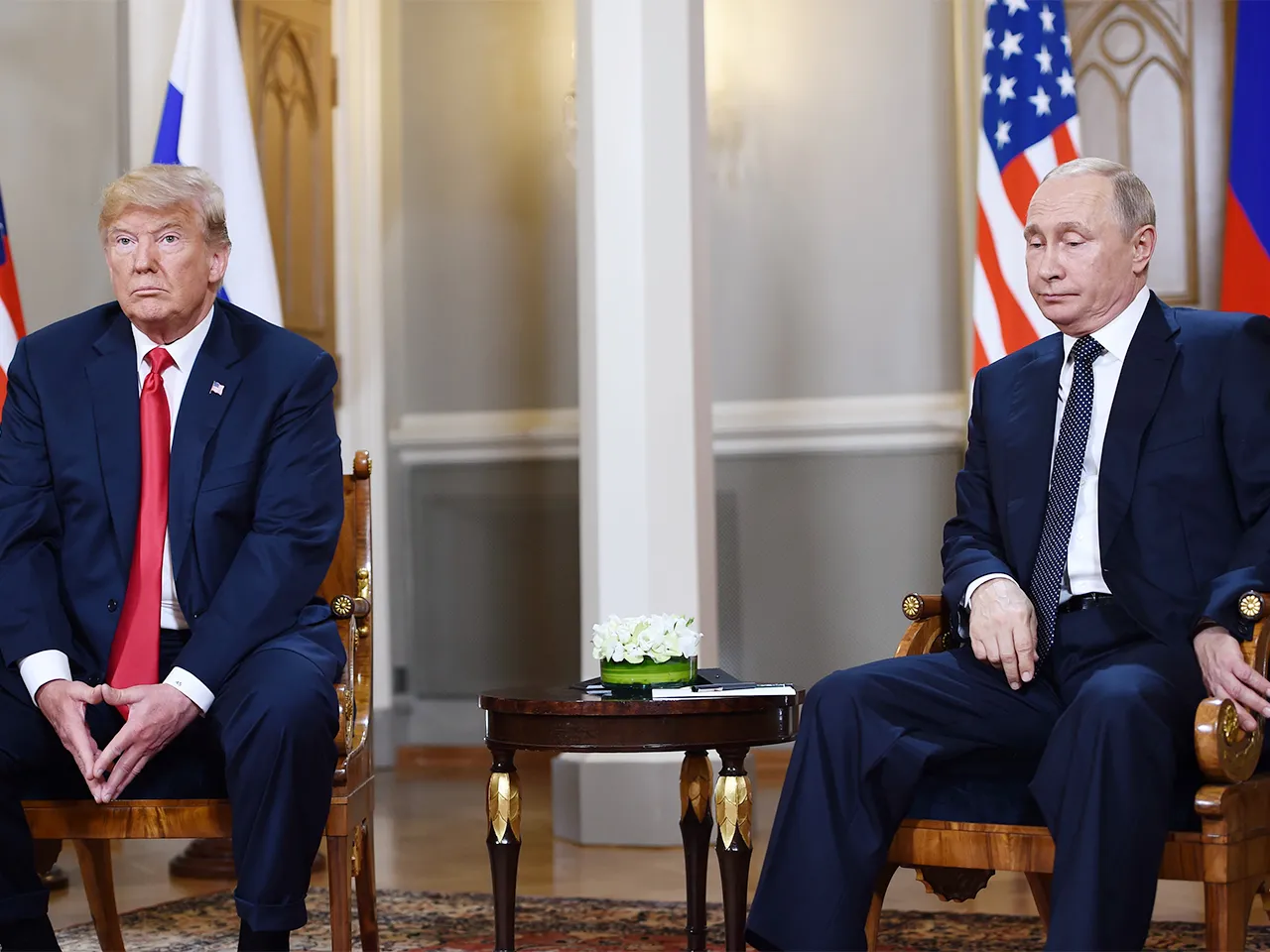Trump sitting with Trump
