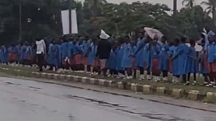 pupils in downpour