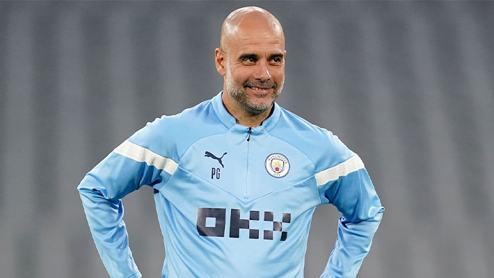 Pep in Man City shirt