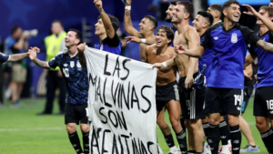 Argentinian players with Falklands banner