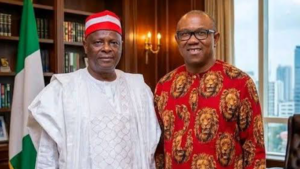 Obi standing with Kwankwaso