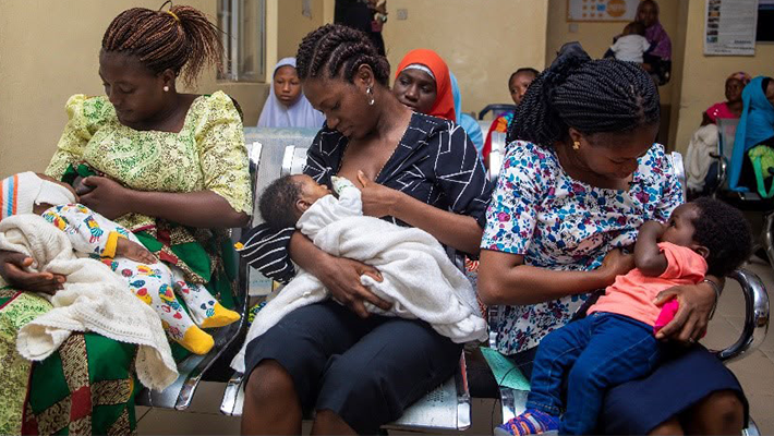 Women breastfeeding their babies