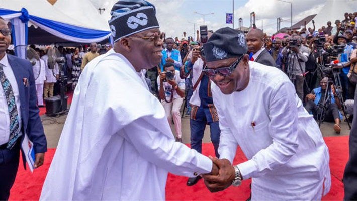 Bola Tinubu in a jolly mood with Wike.