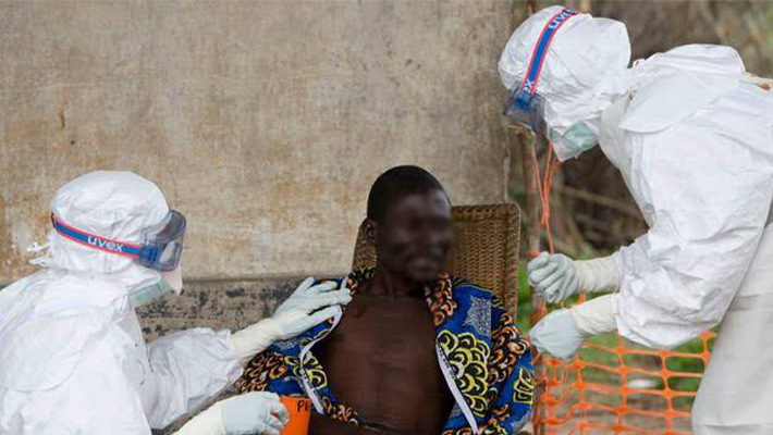 Doctors attending to Ebola patient
