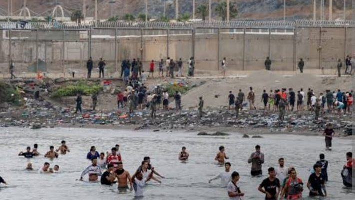 Migrants crossing into Spanish territory