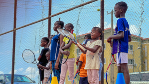 Kids playing tennis