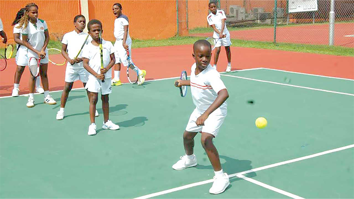 Kids playing tennis